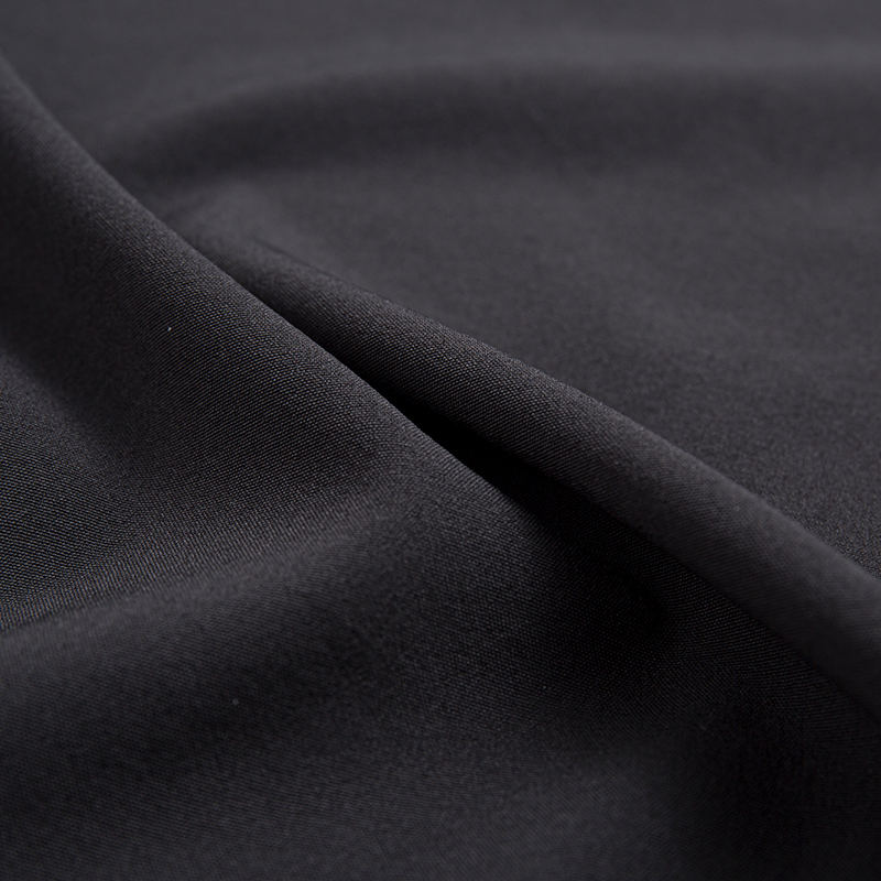 XSKF 100D 130 g/m² vierseitiges Stretchgewebe (Kaffee-Carbon).