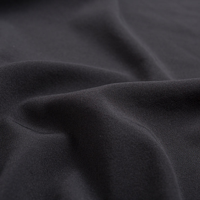 XSKF 100D 130 g/m² vierseitiges Stretchgewebe (Kaffee-Carbon).